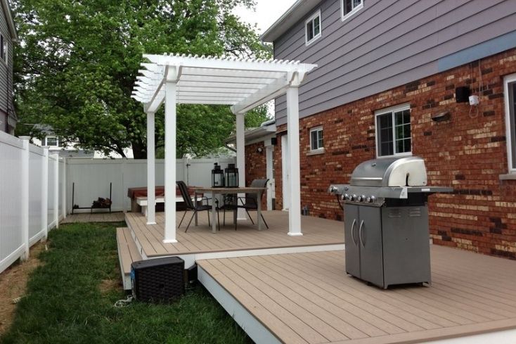 Detached pergola on deck with outdoor kitchen