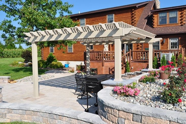 Clay colored vinyl pergola detached from home