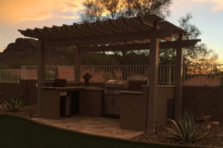 Customizable pergola over a backyard kitchen