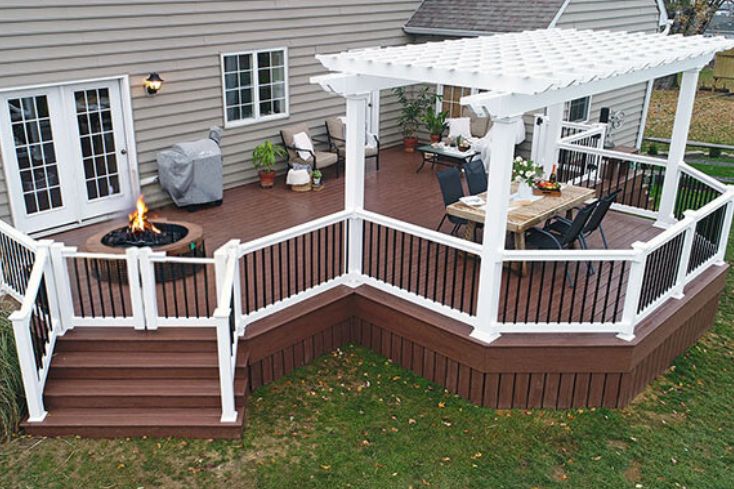 firepit under pergola on composite deck